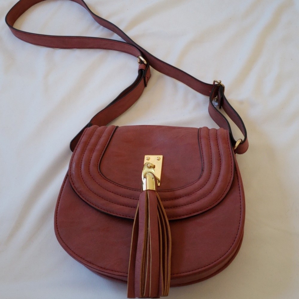 Cute Neiman Marcus tassle crossbody bag